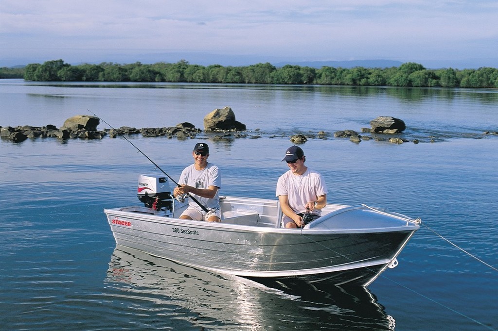 Doing it tough! These two ’fishos’ are having the time of their lives aboard Stacer’s 380 Proline.  © Telwater Stacer